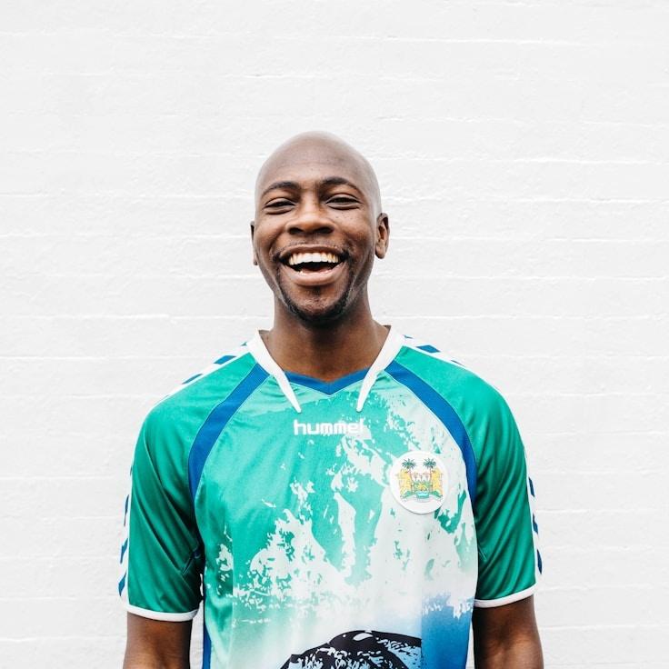 Kaveri Mehta, Lead Design Curator at Crysta Flora Nexus, reviewing corporate floral arrangements